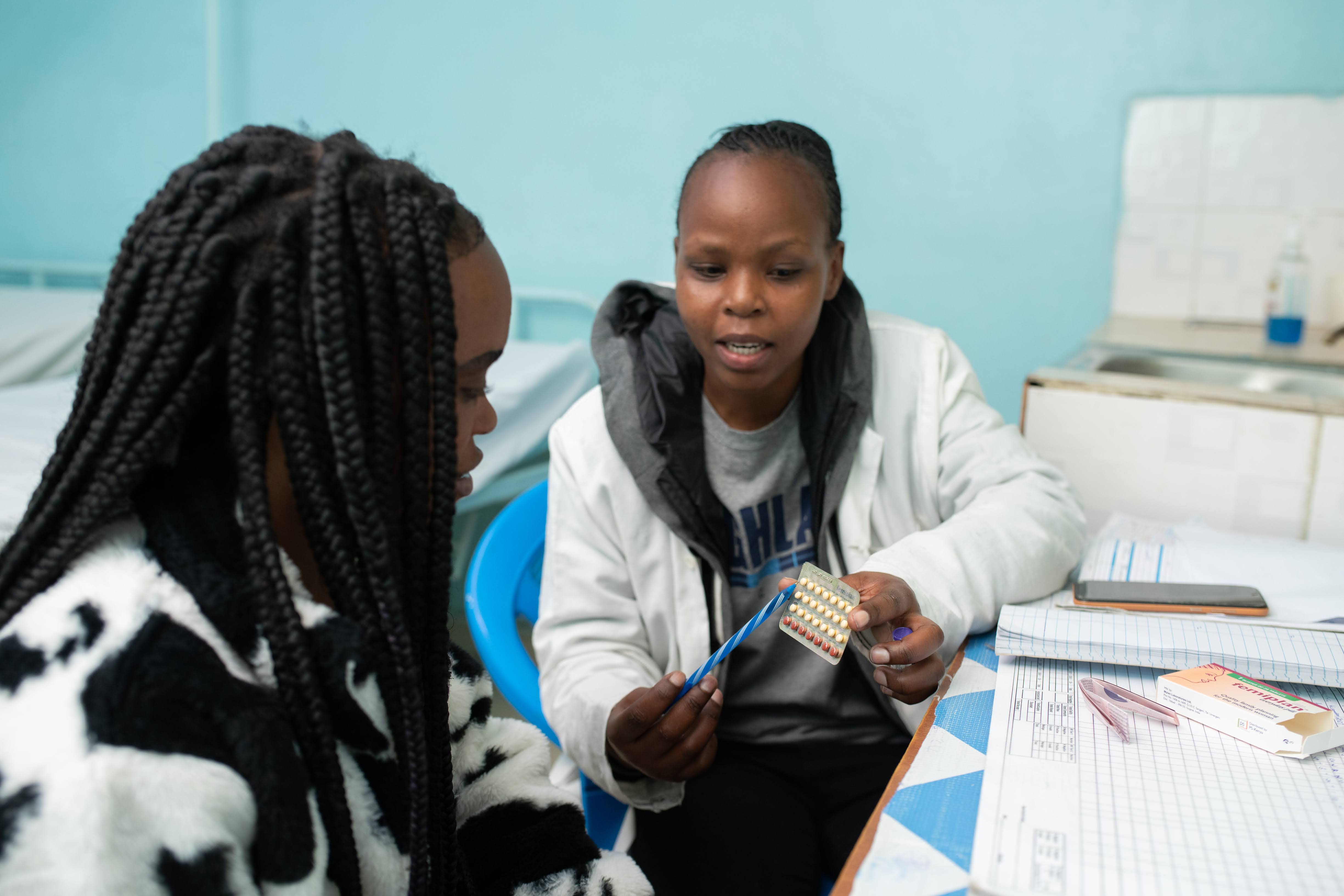 An adolescent girl attends a family planning service at a Tiko clinic in Kenya
